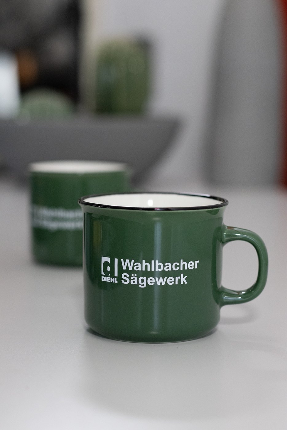 Bedruckte Emailletasse für Wahlbacher Sägewerk